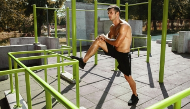 young-muscular-shirtless-caucasian-man-doing-stretching-exercises-playground-sunny-summer-s-day-training-his-upper-body-outdoors-concept-sport-workout